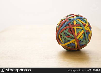 Still life of colorful rubber band ball.