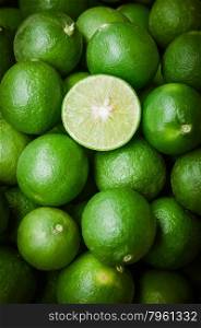 Still life of green lemon cut