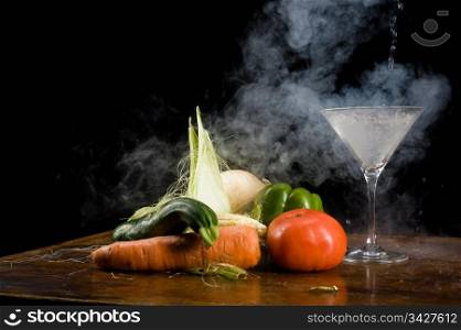 Still life of vegetables and liquid nitrogen