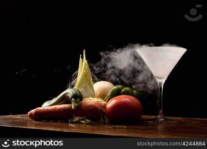 Still life of vegetables and liquid nitrogen