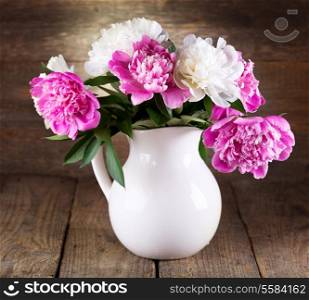 Still life with bouquet of peonies