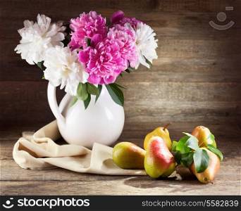 Still life with bouquet of peonies and pears