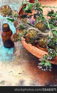 Still life with harvest medicinal herbs. Useful herbs collected in autumn amid the mortars