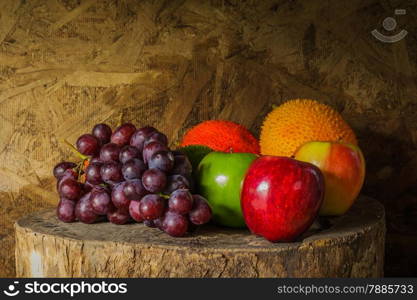 Still life with on the timber full of fruit in the kitchen.