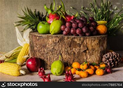 Still life with on the timber full of fruit in the kitchen.