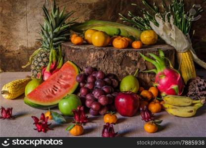 Still life with on the timber full of fruit in the kitchen.
