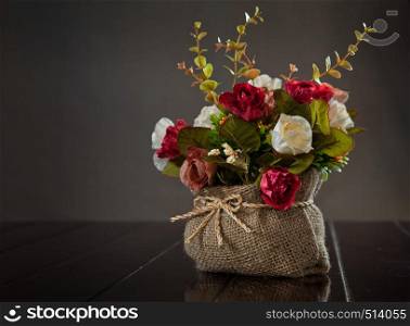still life with rose flower on wall background