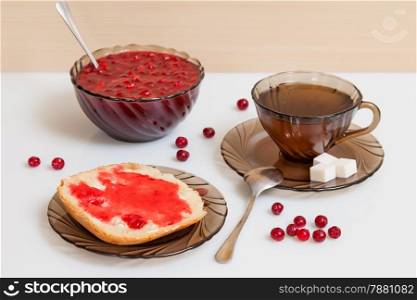 Still life with tea and cranberry