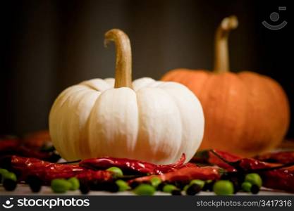 Still Life With Two Pumpkins And Red Peppers