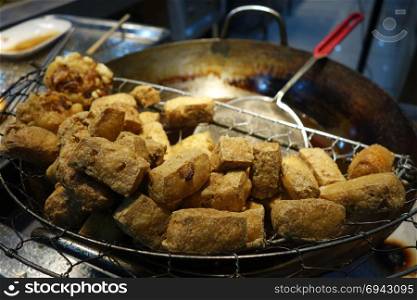 Stinky fried tofu at a Shanghai street food stall