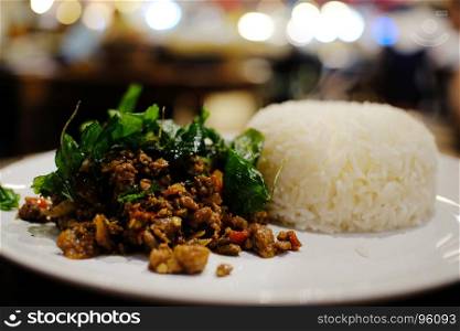 Stir fried chicken and basil with rice Thai street food