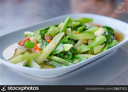Stir fried chinese kale with salted fish. Stir fried kaled with sun dried salted fish