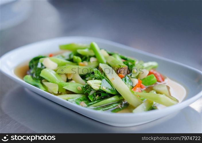 Stir fried chinese kale with salted fish. Stir fried kaled with sun dried salted fish