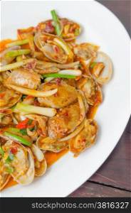 Stir fried clams. Stir fried clams with roasted chili paste and thai basil leaves