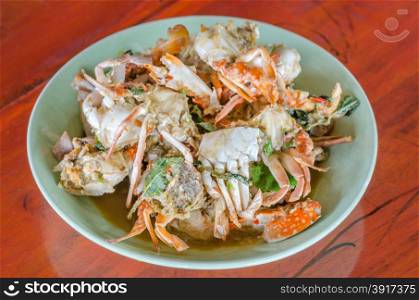 Stir fried Crab with chili &amp; Basil leaves , spicy seafood dish