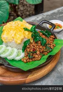 Stir-Fried Minced Pork with holy basil and chili served with Steamed Rice and Thai Omelette. Thai food, Food concept. The typical Thai food.