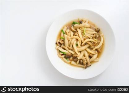 stir-fried mushroom with oyster sauce isolated on white background