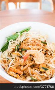 Stir fried noodle with shrimp in thai restuarant