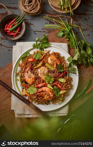 Stir fried noodles with shrimps and vegetables.