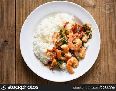 Stir fried shrimp, Cooked rice and fried basil with shrimps prawns,Thai food rice topped shrimp with holy basil leaves