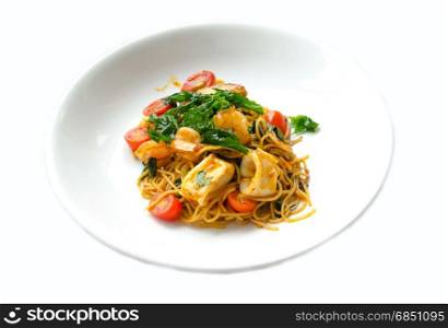 Stir fried spicy spaghetti with seafood call KEE MAO TA LAY on white background