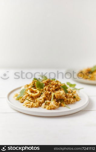 Stir fried squid with curry powder, Thai food