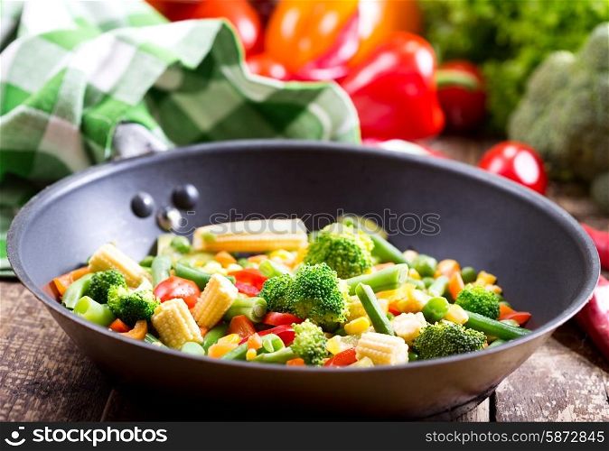 stir fried vegetables in the pan