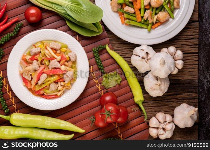 Stir-fried with bell peppers, pork, crab sticks and mushrooms.