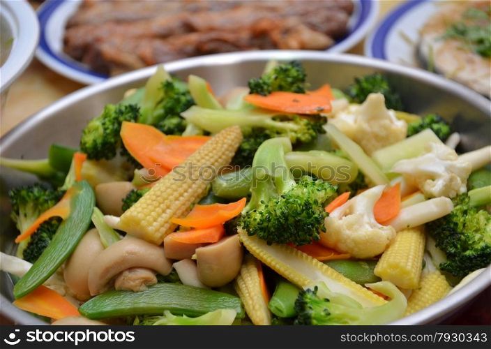 Stir-fry of various type of vegetable in a wok. Stir-fry in a wok