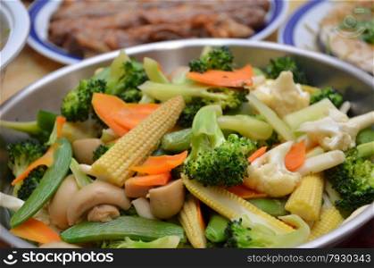 Stir-fry of various type of vegetable in a wok. Stir-fry in a wok
