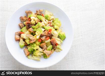 Stir fry Romanesco broccoli with crispy pork and chili, very healthy and delicious