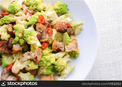 Stir fry Romanesco broccoli with crispy pork and chili, very healthy and delicious