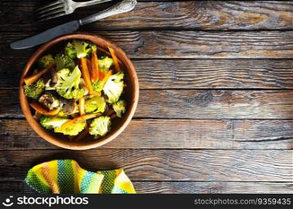 Stir fry vegetables in bowl. broccoli, carrot and onion