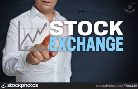 Stock exchange touchscreen is operated by man concept.. Stock exchange touchscreen is operated by man concept