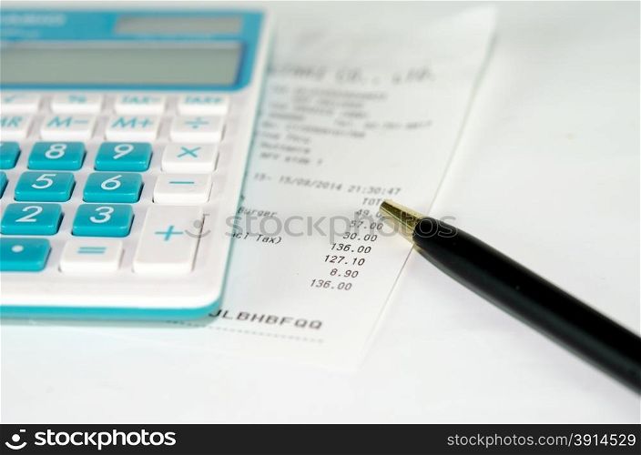 stock image of the receipt paper and calculator