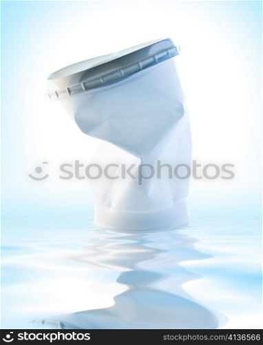 Stock photo: an image of a big white mauled plastic cup closeup