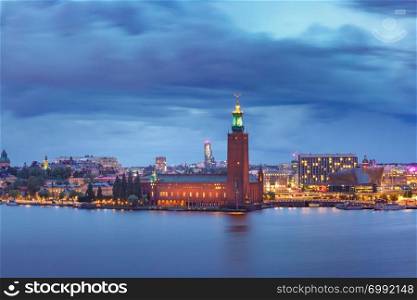 Stockholm City Hall or Stadshuset at night in the Old Town in Stockholm, capital of Sweden. Stockholm City Hall at night, Stockholm, Sweden