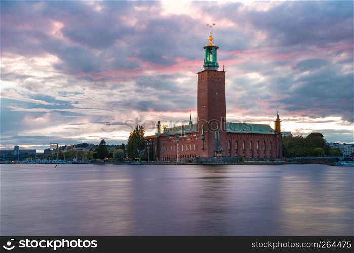 Stockholm City Hall or Stadshuset at sunset in the Old Town in Stockholm, capital of Sweden. City Hall at sunset, Stockholm, Sweden