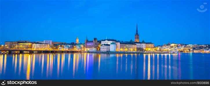 Stockholm cityscape skyline with view of Gamla Stan at night in Stockholm, Sweden.