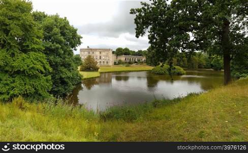 Stockport, United Kingdom - July 24, 2018: Lyme Hall, a historic English stately home inside Lyme Park in Cheshire, England. It is a popular tourist attraction.