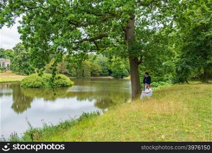 Stockport, United Kingdom - July 24, 2018: People dressed in Edwardian costumes at Lyme Hall, a historic English stately home inside Lyme Park in Cheshire, England.