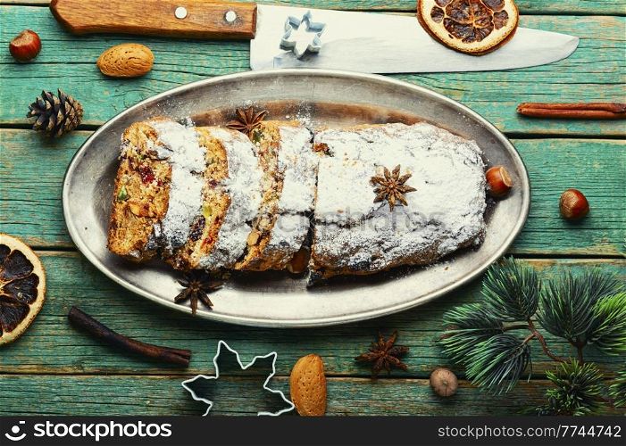 Stollen is a tasty German Christmas pastry. Xmas cake. Stollen, a German Christmas pie