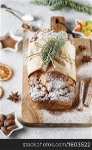 Stollen is fruit bread of nuts, spices, dried or candied fruit, coated with powdered sugar. It is traditional German bread eaten during the Christmas season. New year prep. Holiday baking