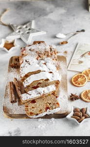 Stollen is fruit bread of nuts, spices, dried or candied fruit, coated with powdered sugar. It is traditional German bread eaten during the Christmas season. New year prep. Holiday baking