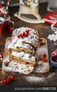 Stollen is fruit bread of nuts, spices, dried or candied fruit, coated with powdered sugar. It is traditional German bread eaten during the Christmas season. New year prep. Holiday baking