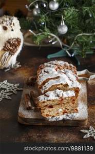Stollen is fruit bread of nuts, spices, dried or candied fruit, coated with powdered sugar. It is traditional German bread eaten during the Christmas season. New year prep. Holiday baking