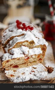 Stollen is fruit bread of nuts, spices, dried or candied fruit, coated with powdered sugar. It is traditional German bread eaten during the Christmas season. New year prep. Holiday baking