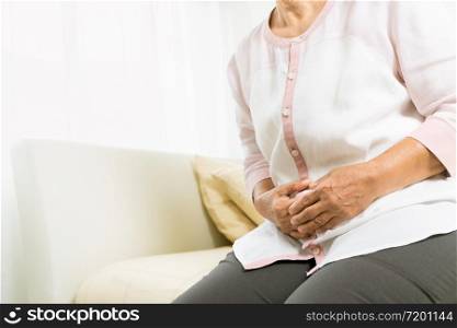 stomach pain of old woman at home, healthcare problem of senior concept