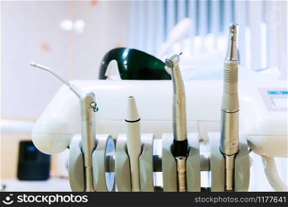 Stomatological tool kit. Closeup hightech Dentist equipments.. Stomatological tool kit. Closeup hightech Dentist equipments