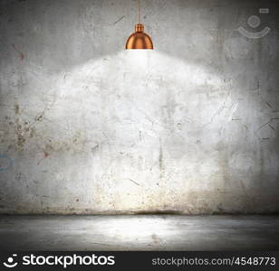 Stone blank wall. Stone blank wall illuminated with hanging above lamp. Place for text